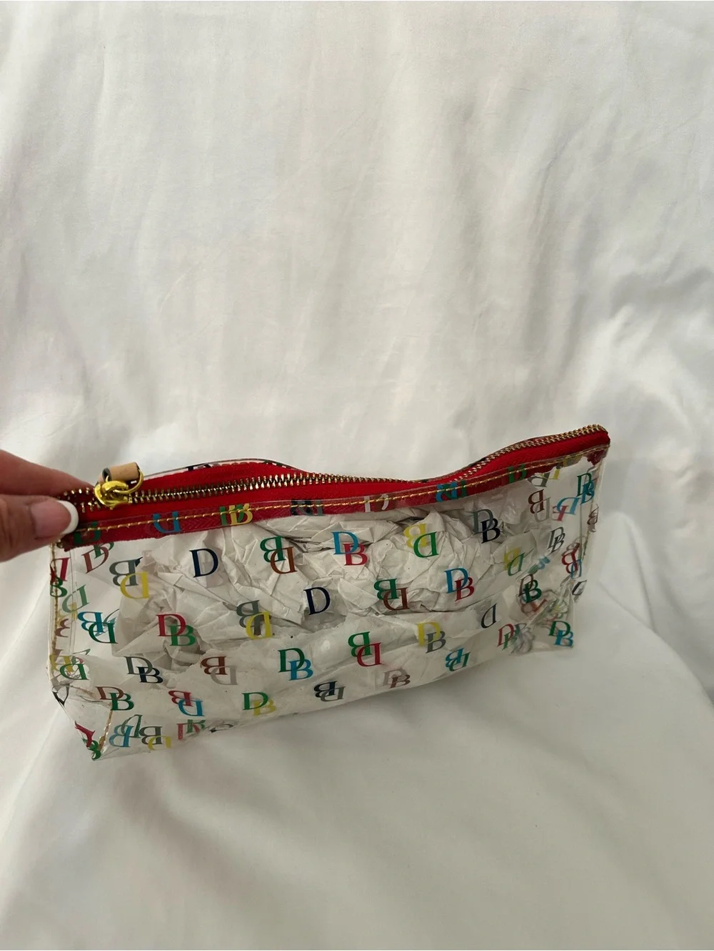 Dooney & Bourke Clear Cosmetic Pouch with Multicolor DB Print and Red Trim